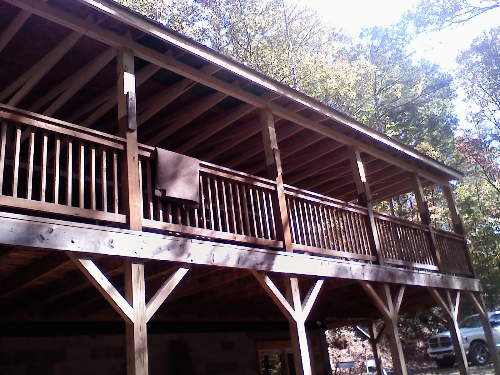 Timber framing under a new elevated porch and deck — Roof Leak Repair in Johnson Creek by Roofing Brothers